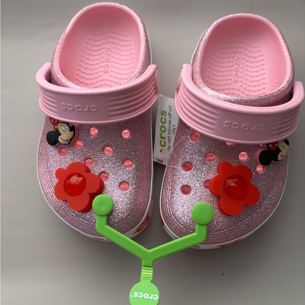 CROCS Pink and Red Sandals with Floral Embellishments